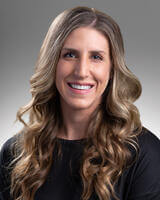 Mallory Summerer smiling for professional headshot