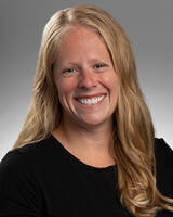 Catherine Nelson smiling for professional headshot