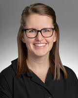 Molly Brynjulson smiling for professional headshot