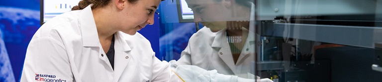 imaginetics researcher looking through glass