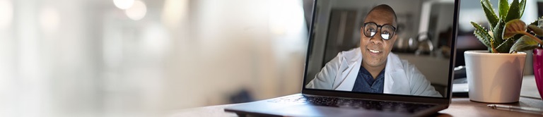 Provider shown on laptop screen during virtual visit