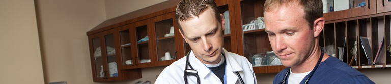 doctor talking with nurse