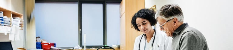 Doctor speaking with patient