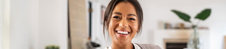 Woman smiling.