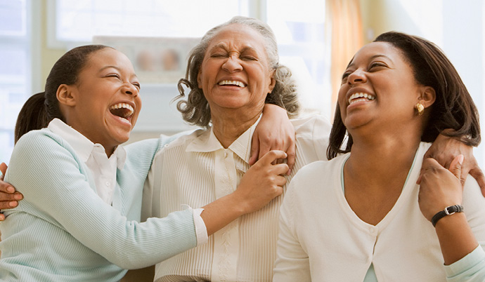 three woman smiling together