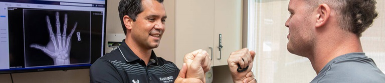 Sanford Health Orthopedics and Sports Medicine provider with a patient