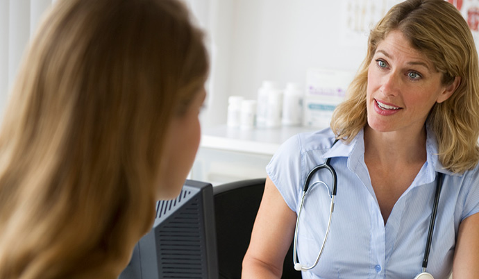 specialist talking with a patient