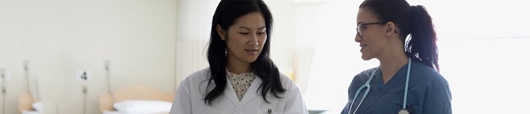 doctor talking to a nurse