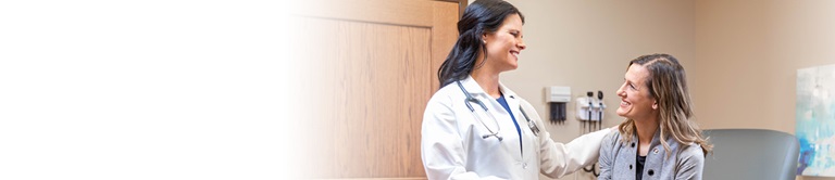 Nurse performing a check-up on a patient.