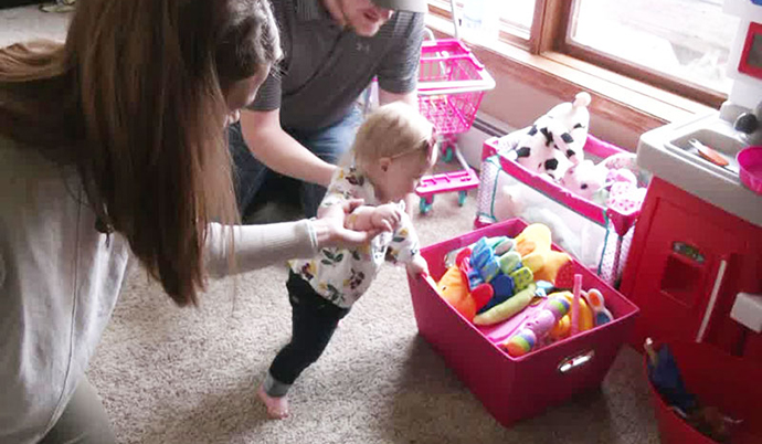 Baby playing with toys.