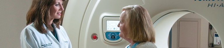 michele lohr talking with a patient