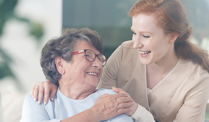 volunteer smiling with a patient
