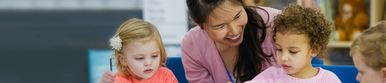 teacher working with small children