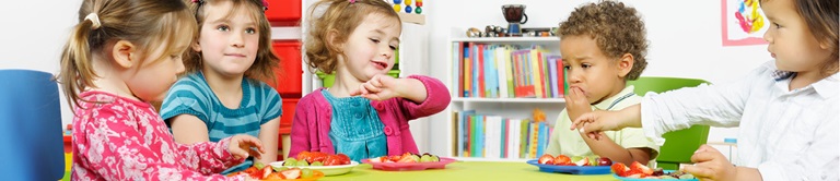 small children around a table