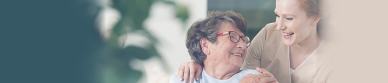 woman helping older woman